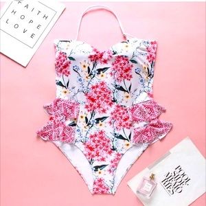 Patterned pink one piece swimsuit